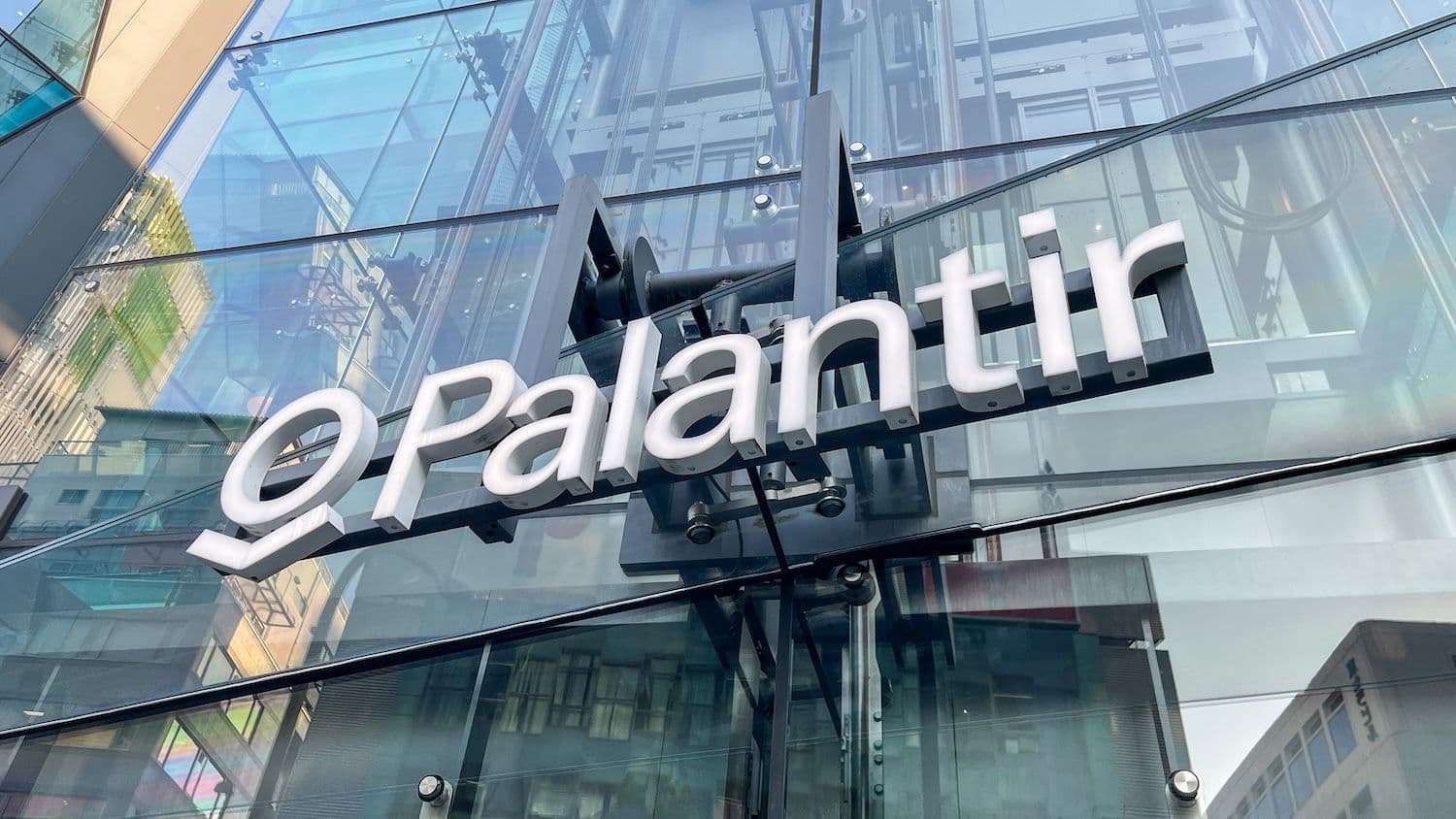 Palantir CEO Alex Karp argues Anthropic and OpenAI seek nationalization as a shield from client lawsuits over AI. (Image: Shutterstock)