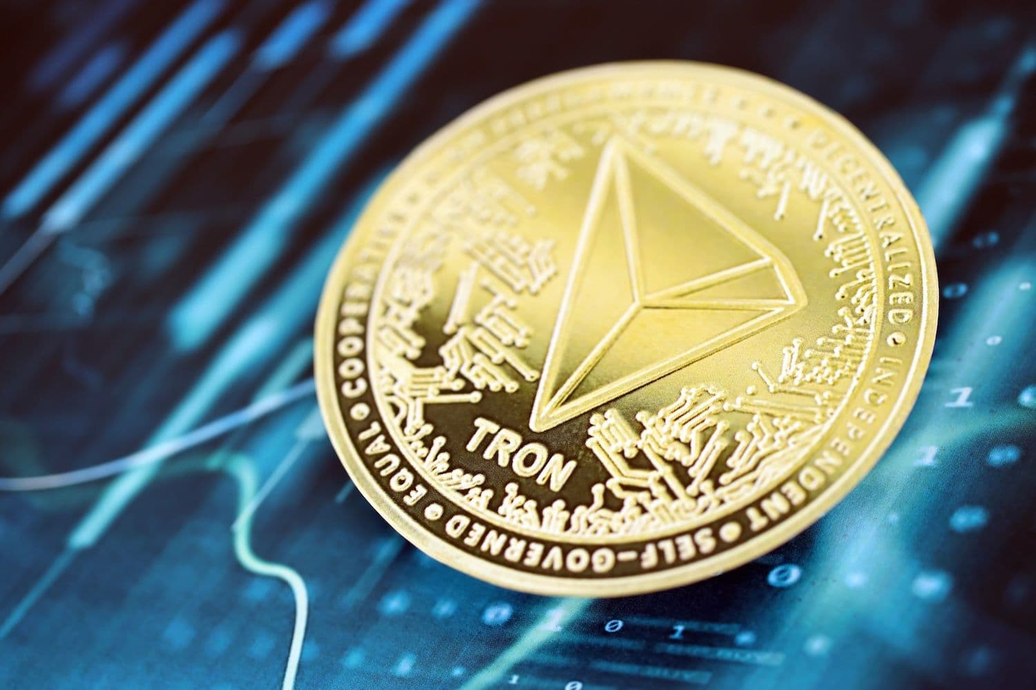 Messari data shows TRON clearing $2.1 trillion in USDT transfers as DeFi value locked falls 1.9%, with TRX flat. (Image: Shutterstock)